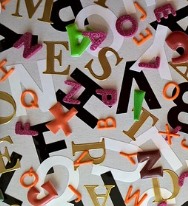 a colorful pile of assorted letters