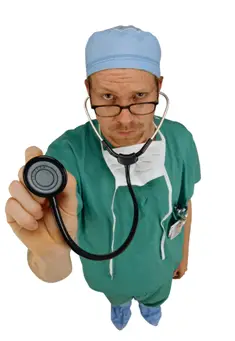 A medical doctor in scrubs and mask, pointing a stethoscope forward